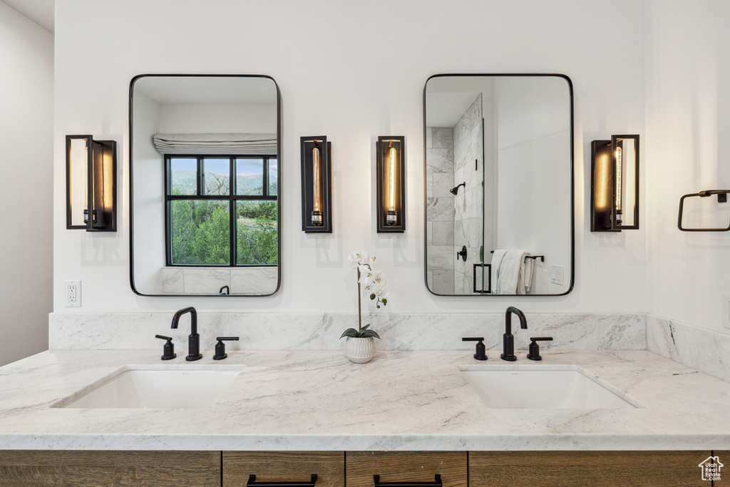 Bathroom featuring vanity and walk in shower