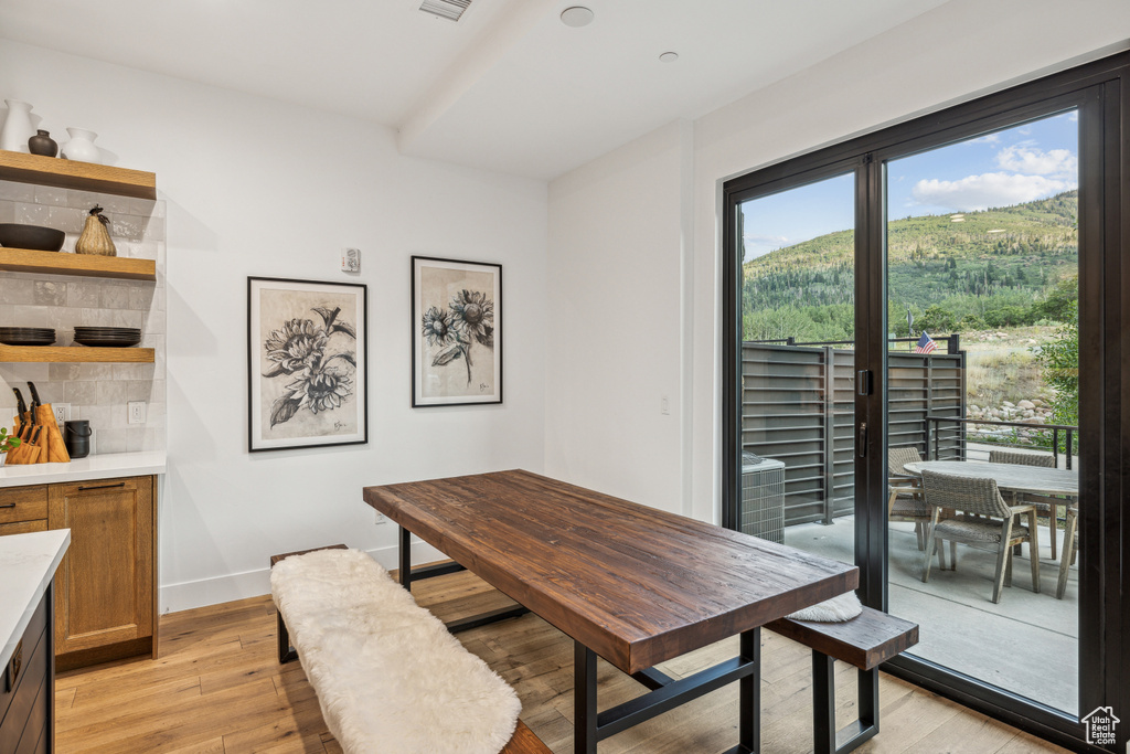 Dining room with light wood-type flooring