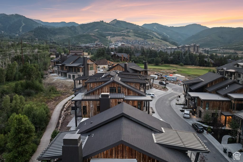 Aerial view at dusk featuring a mountain view