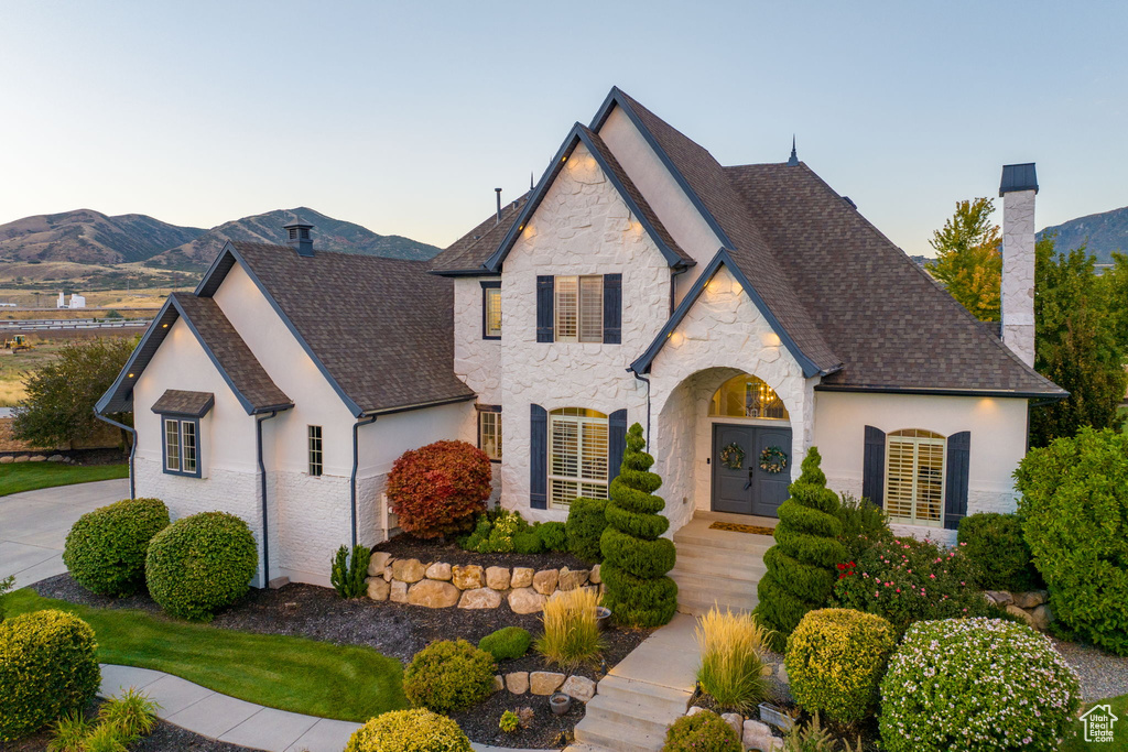 View of front of home with a mountain view