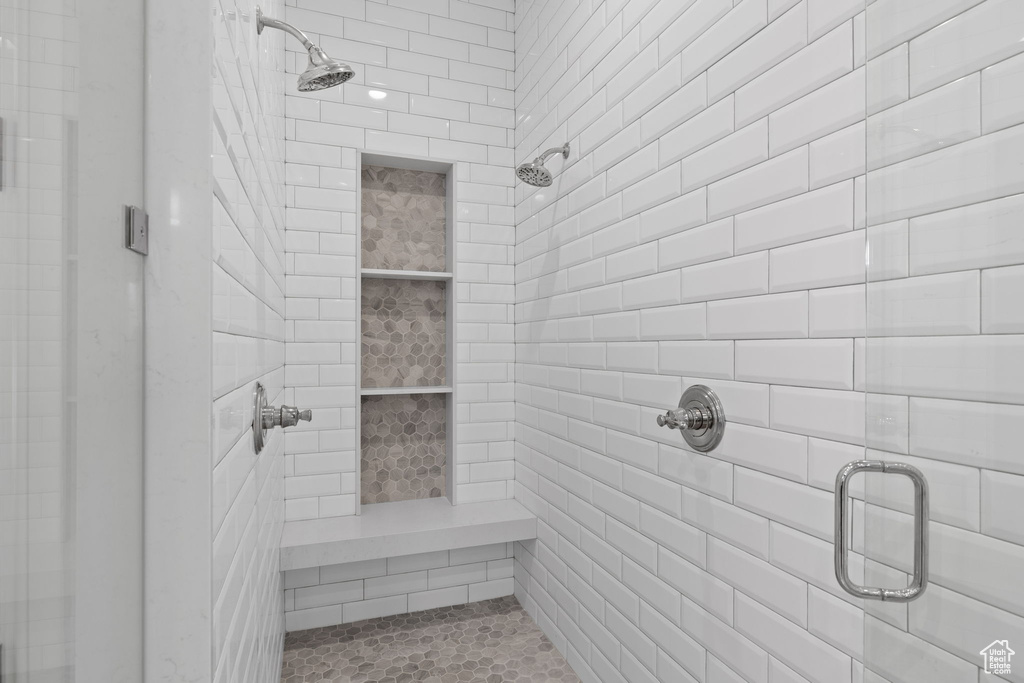 Bathroom featuring a shower with shower door