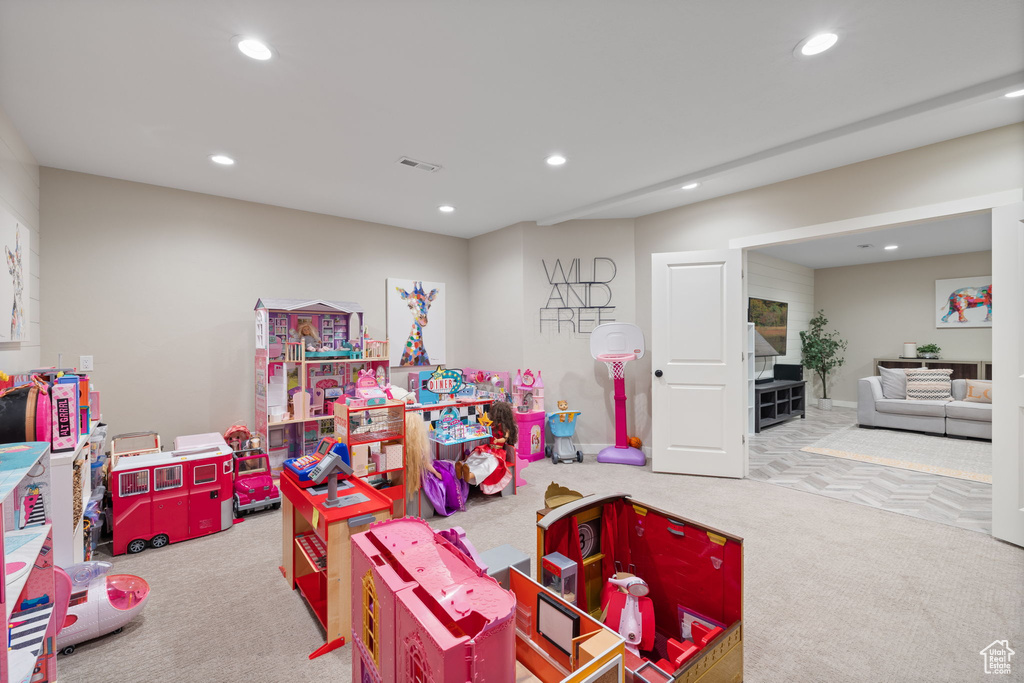 Playroom with light colored carpet