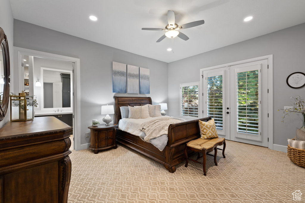 Bedroom with french doors, access to exterior, and ceiling fan