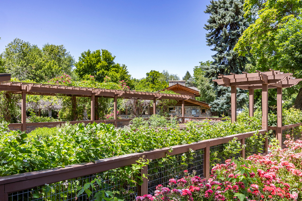 View of property's community with a pergola