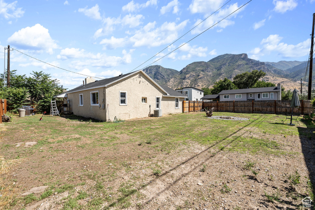 Exterior space featuring a mountain view and central AC