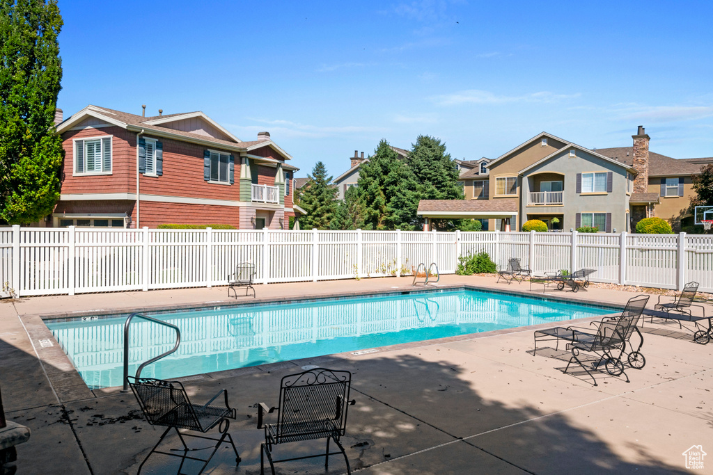 View of swimming pool with a patio