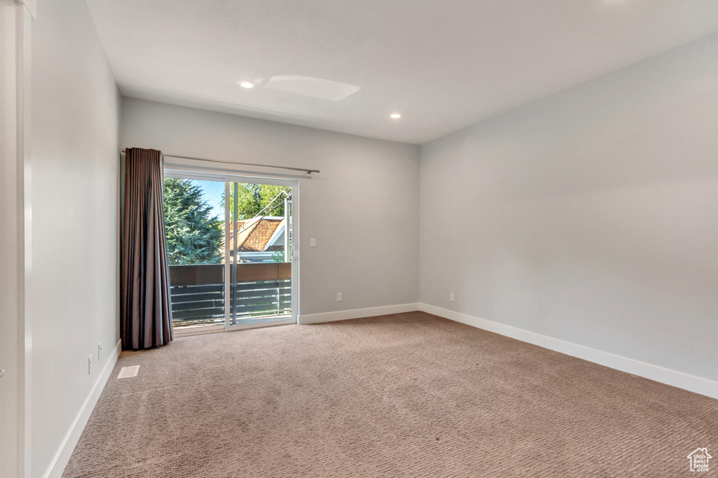 View of carpeted spare room