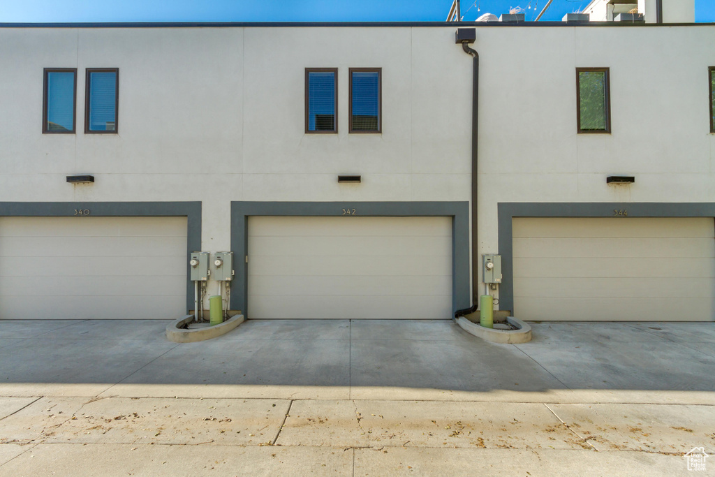 View of property with a garage