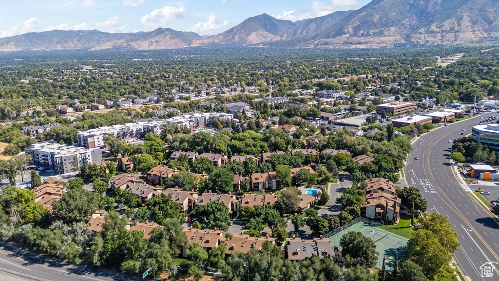 Birds eye view of property with a mountain view