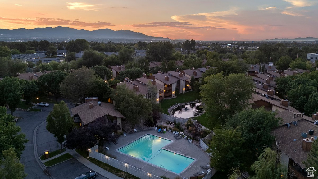 Aerial view at dusk featuring a mountain view