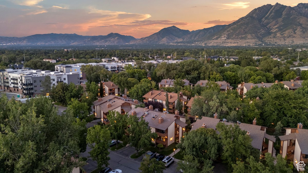 Aerial view at dusk featuring a mountain view