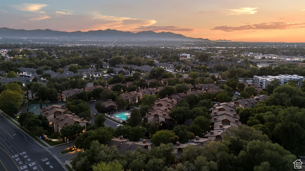 Aerial view at dusk featuring a mountain view