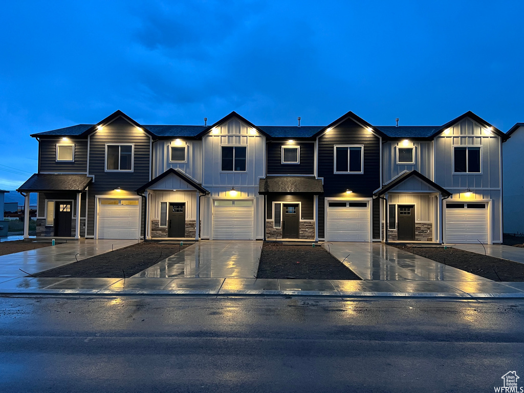 View of property featuring a garage