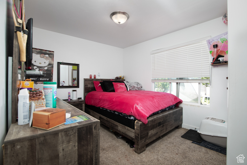 Bedroom featuring carpet flooring