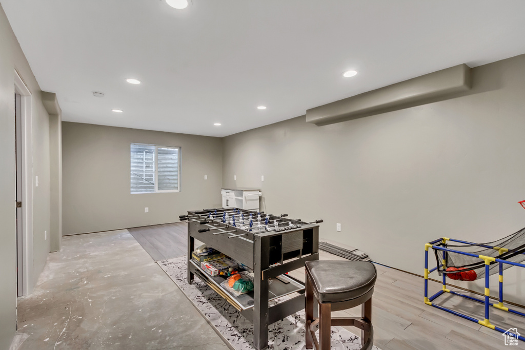 Game room featuring light hardwood / wood-style flooring