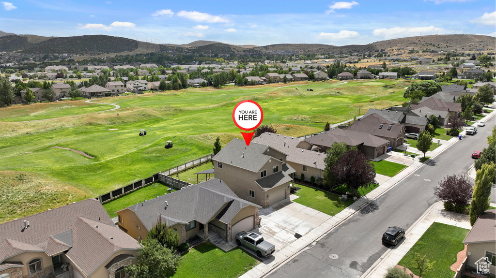 Birds eye view of property featuring a mountain view