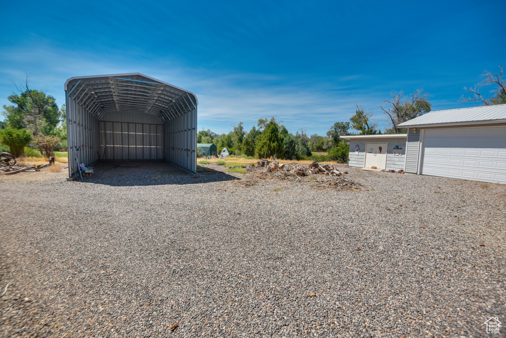 Exterior space with a carport