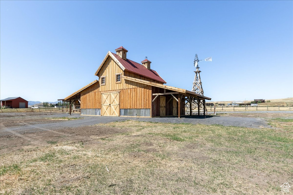 View of outdoor structure with a rural view