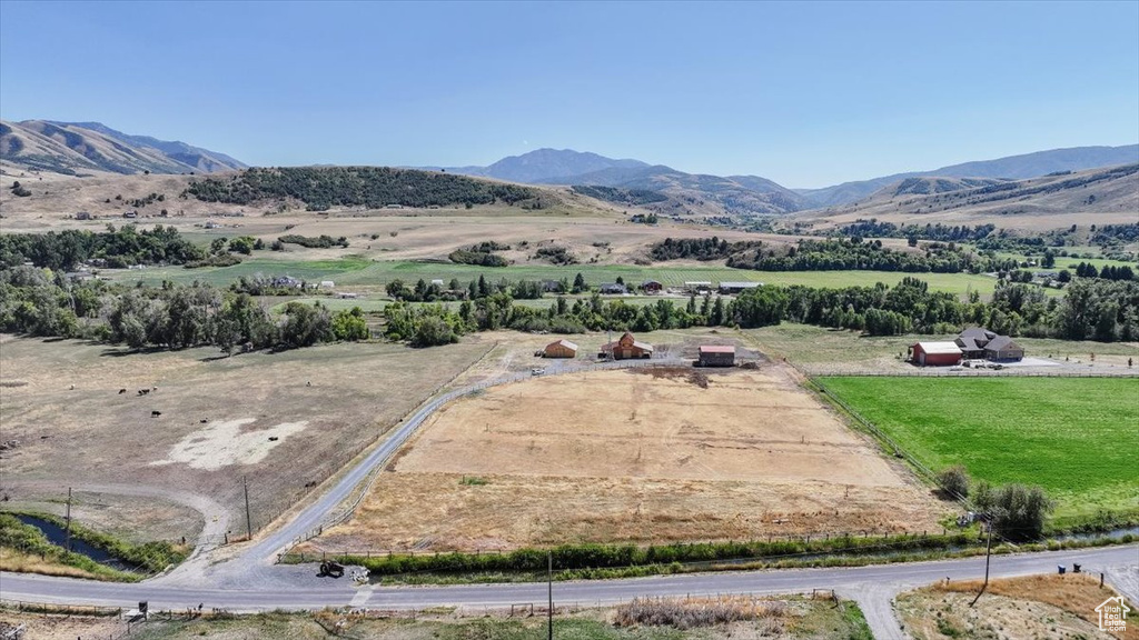 Property view of mountains featuring a rural view