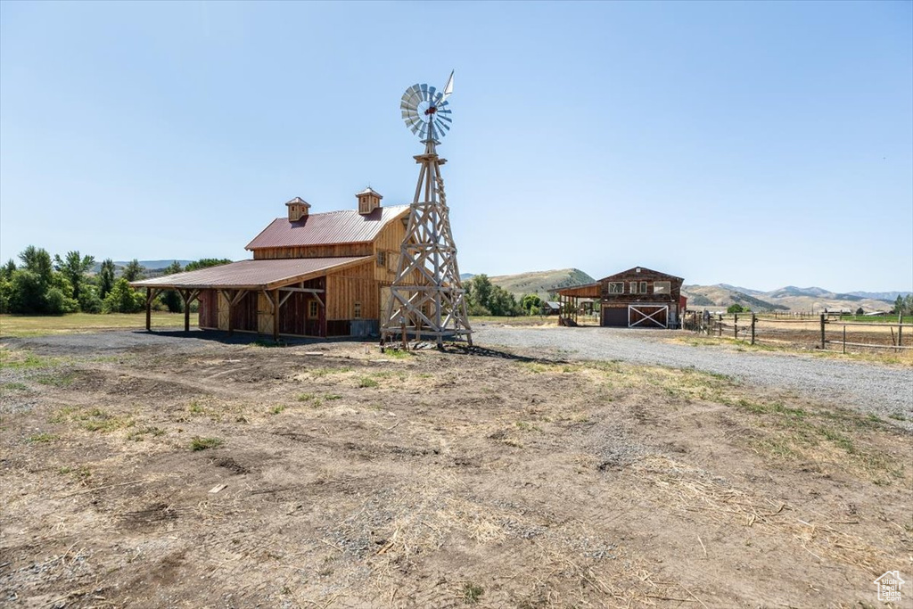 Exterior space with a mountain view and a rural view