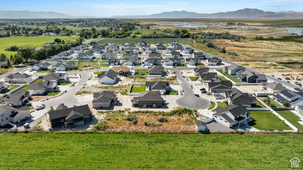 Birds eye view of property with a mountain view