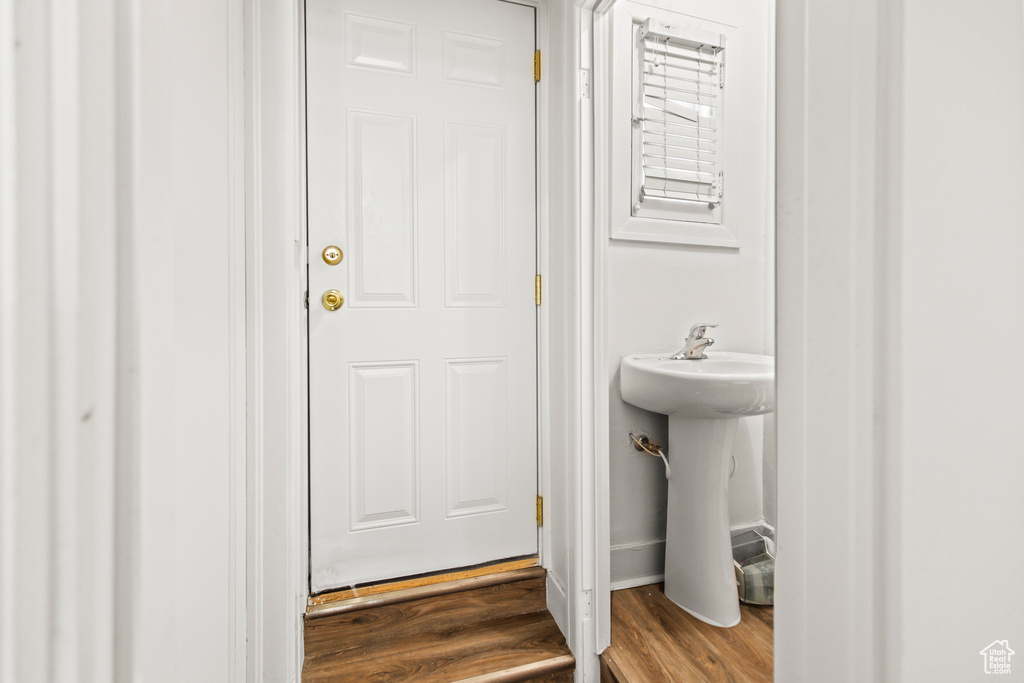 Bathroom with wood-type flooring and sink