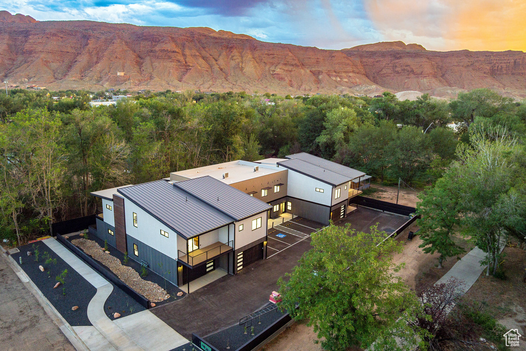 Aerial view at dusk with a mountain view