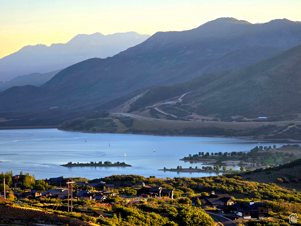 Mountain view featuring a water view