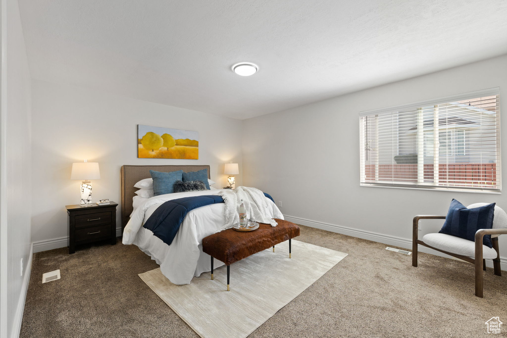 View of carpeted bedroom