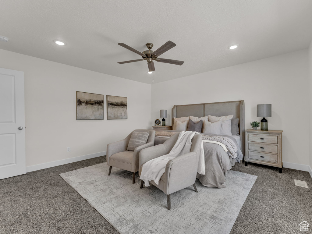 Carpeted bedroom with recessed lighting, baseboards, and ceiling fan