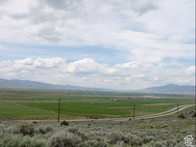 View of mountain feature with a rural view