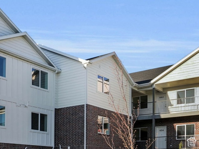 Exterior space featuring a balcony