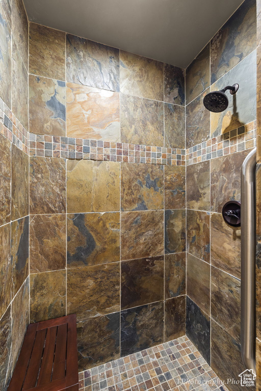 Bathroom featuring a tile shower