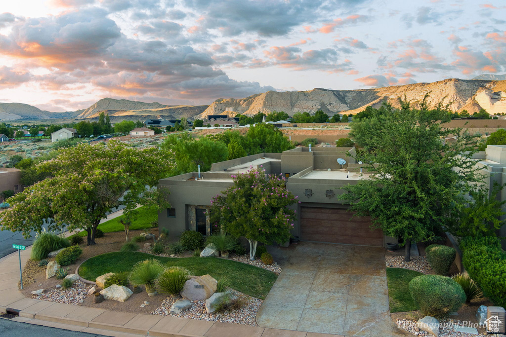 Aerial view at dusk with a mountain view