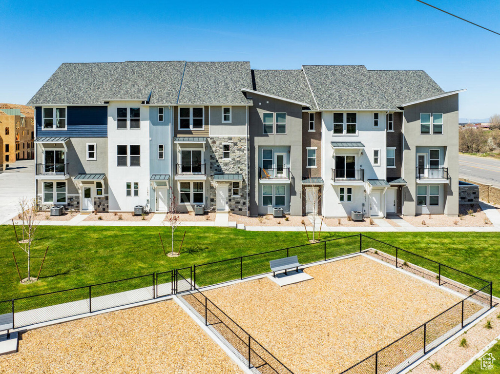 Exterior space with a yard and a patio area