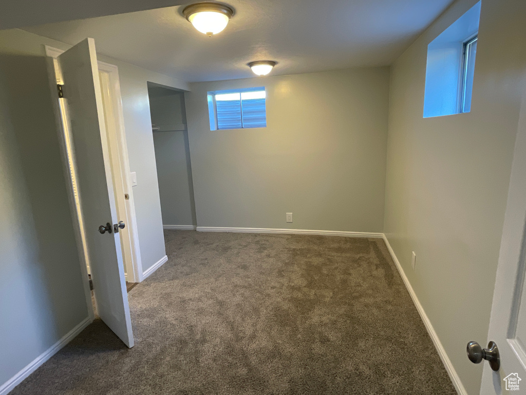 Basement with carpet