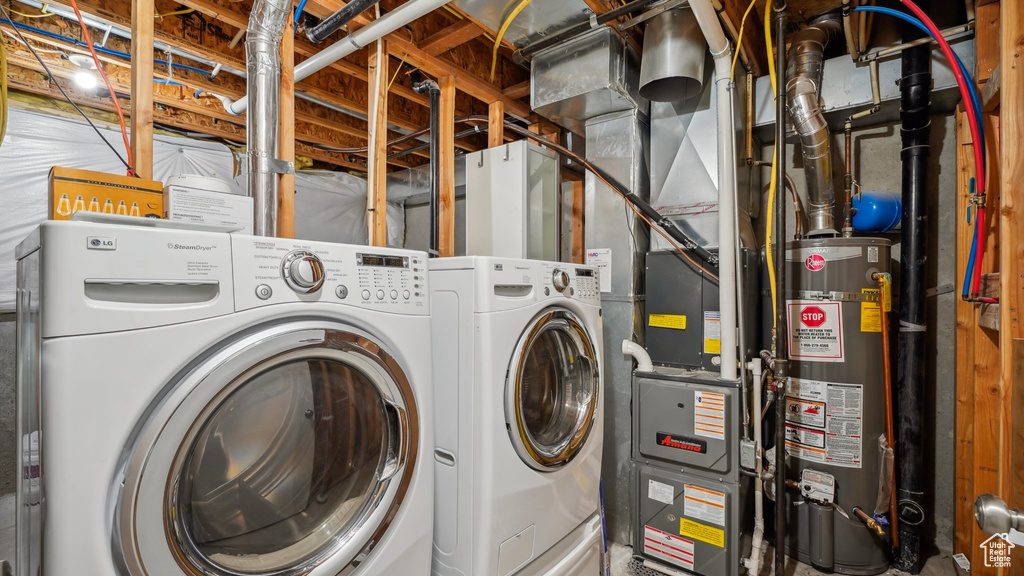 Laundry room with separate washer and dryer and water heater