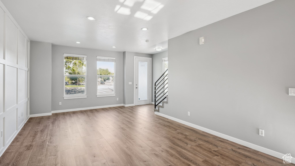 Spare room with light hardwood / wood-style flooring