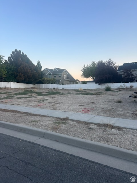 View of yard at dusk