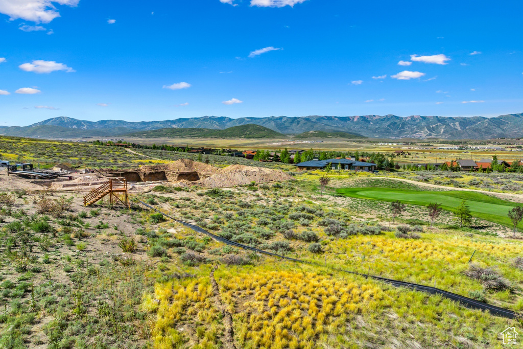 Property view of mountains with a rural view