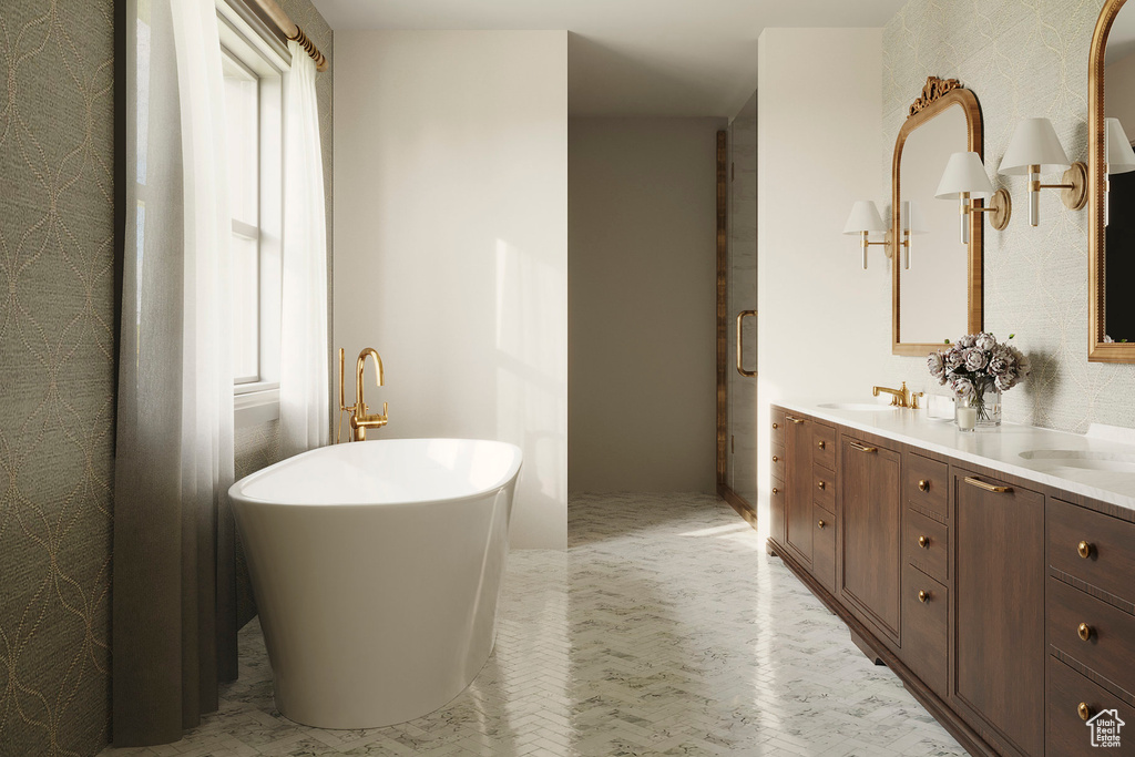 Bathroom featuring a bath and vanity