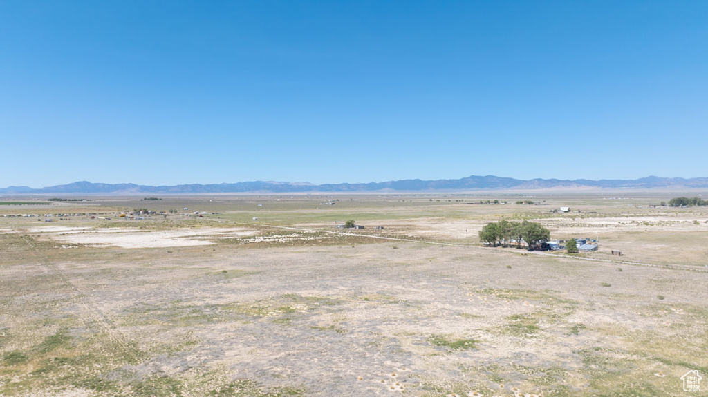 Property view of mountains featuring a rural view