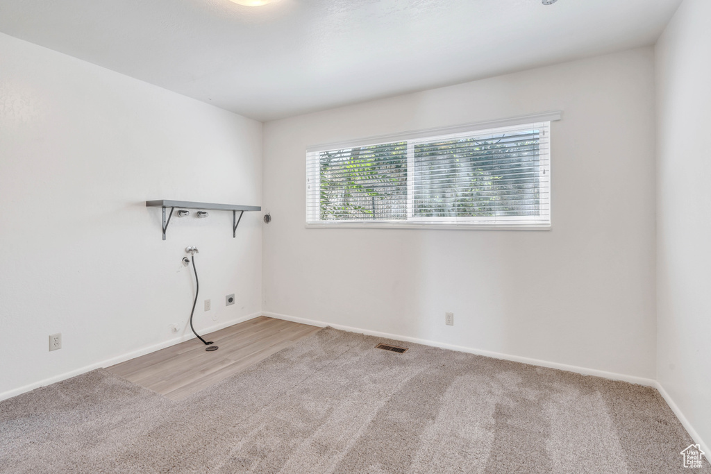 Spare room featuring light hardwood / wood-style floors