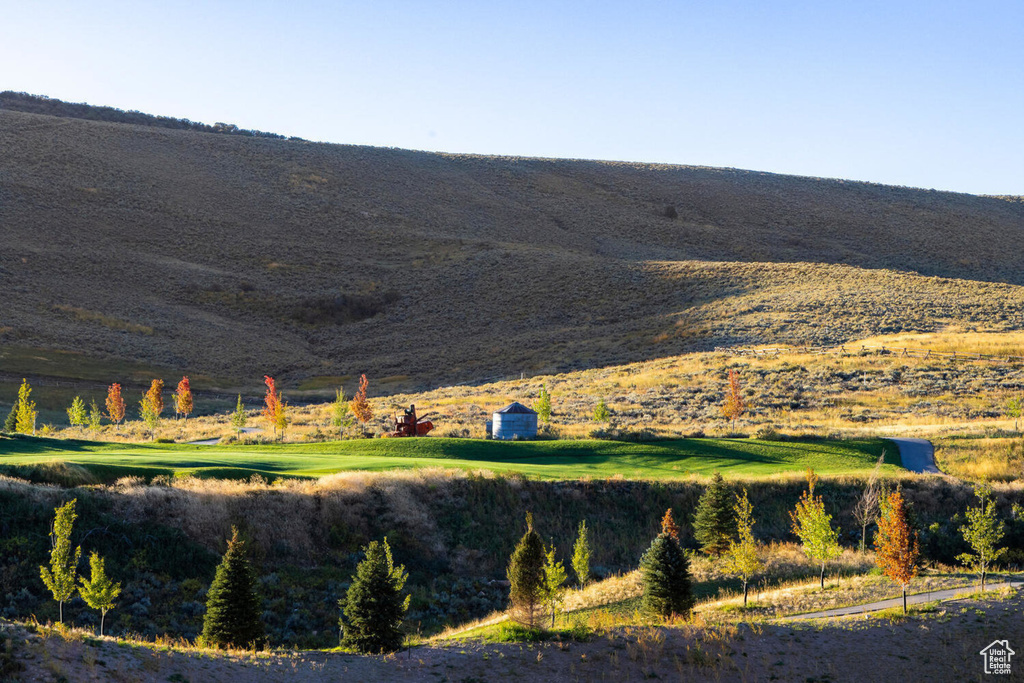 Property view of mountains with a rural view