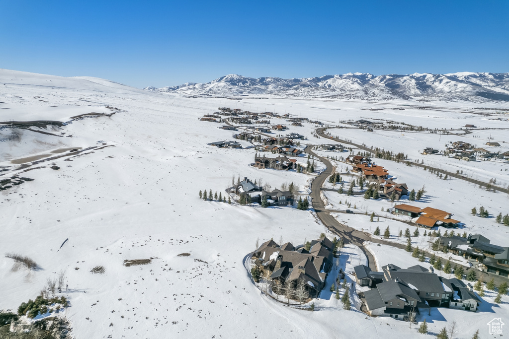 Snowy aerial view with a mountain view