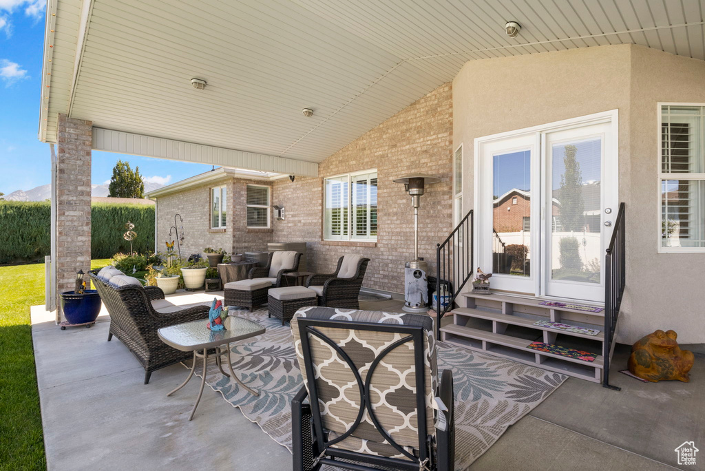 View of patio featuring an outdoor hangout area