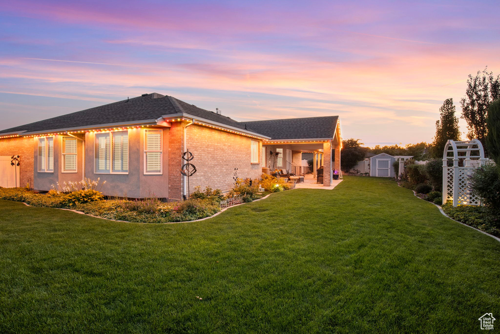 Exterior space featuring a yard