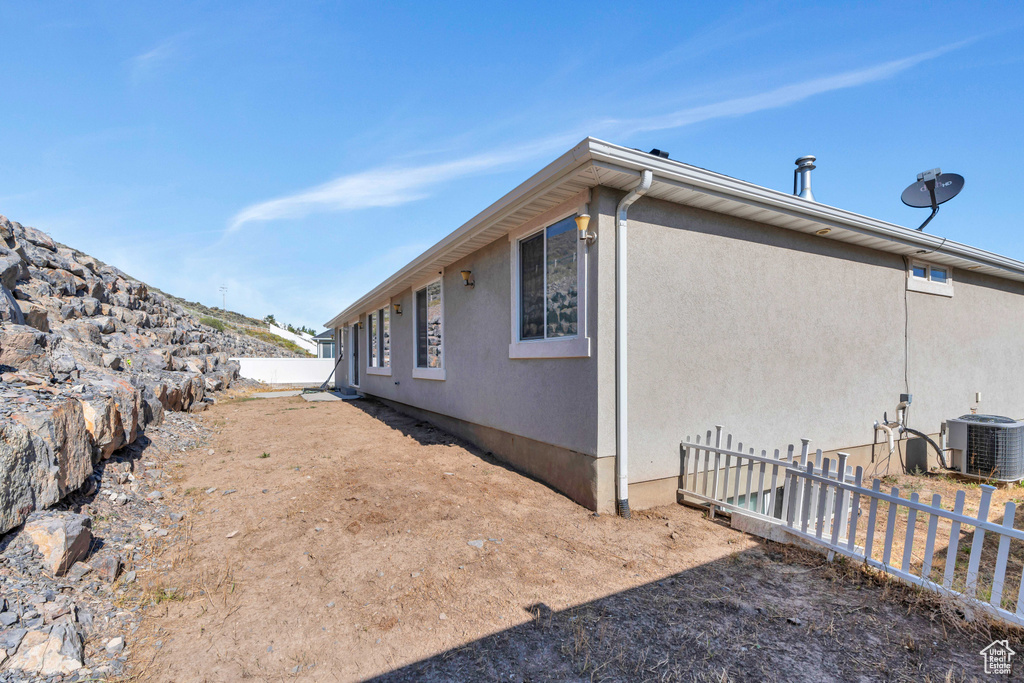 View of property exterior featuring central air condition unit