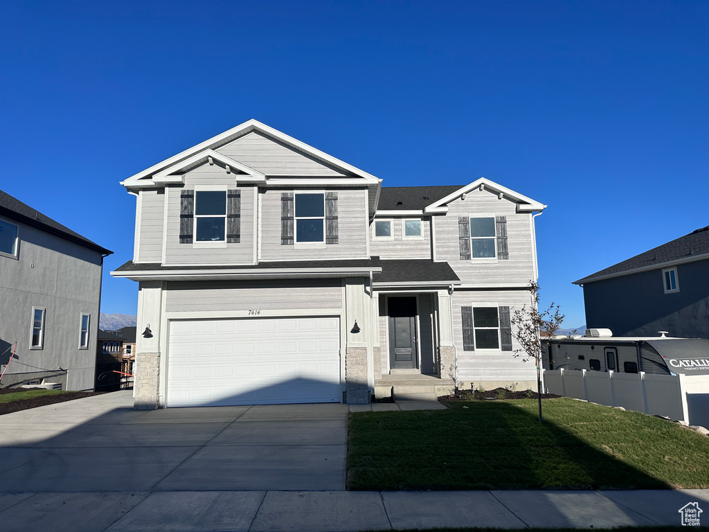 View of front of house featuring a garage