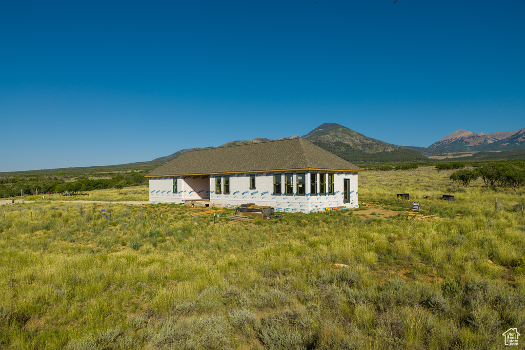 View of mountain feature with a rural view